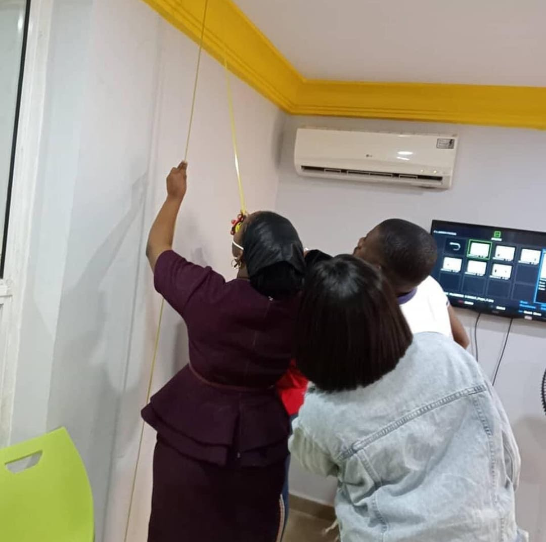 Students taking a measured survey on site